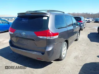 2011 Toyota Sienna with VIN 5TDZK3DC6BS125737, listed as a IAAI auction lot 41815233 with 248,318 mi miles. Bid and sale history available at carsss.com. Image 4.
