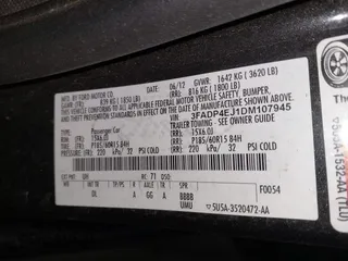 2013 Ford Fiesta SE with VIN 3FADP4EJ1DM107945, listed as a IAAI auction lot 42025064 with Not Provided miles and . Bid and sale history available at DreamBid. Image 9.