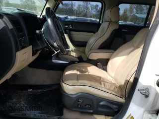 2006 Hummer H3 with VIN 5GTDN136668116685, listed as a Copart auction lot 74241474 with 144,273 mi miles and Salvage Title. Bid and sale history available at carsss.com. Image 7.