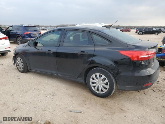 2016 Ford Focus S with VIN 1FADP3E22GL297232, listed as a Copart auction lot 45947005 with 105,497 mi miles and Salvage Title. Bid and sale history available at carsss.com. Image 2.