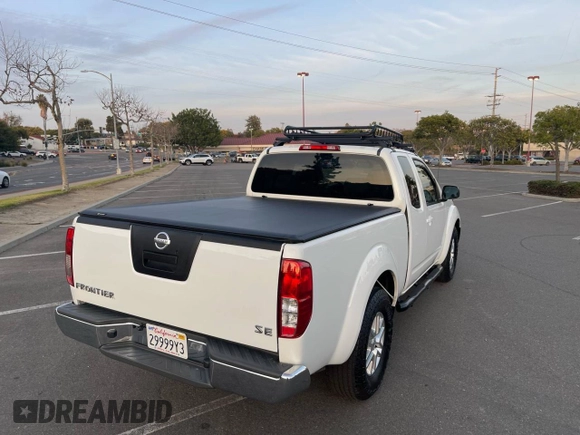 2012 Nissan Frontier SV with VIN 1N6BD0CT2CN700528, listed as a Copart auction lot 59704835 with 61,918 mi miles and Clean title. Bid and sale history available at DreamBid. Image 4.
