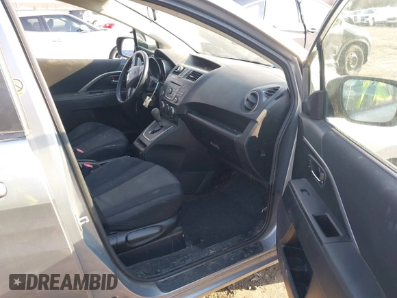 2012 Mazda 5 Sport with VIN JM1CW2BL1C0115788, listed as a IAAI auction lot 41770484 with 154,182 mi miles. Bid and sale history available at carsss.com. Image 5.