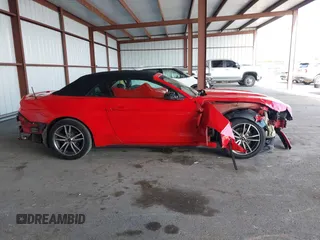 2016 Ford Mustang EcoBoost Premium z VIN 1FATP8UH5G5247265, wystawiony jako IAAI lot #42502161 z przebiegiem 116 460 mil mil oraz . Historia ofert i sprzedaży dostępna na DreamBid. Obrazek 14.
