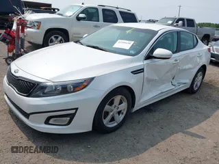 2015 Kia Optima LX z VIN KNAGM4A72F5627037, wystawiony jako IAAI lot #42399339 z przebiegiem 149 612 mil mil oraz . Historia ofert i sprzedaży dostępna na DreamBid. Obrazek 2.