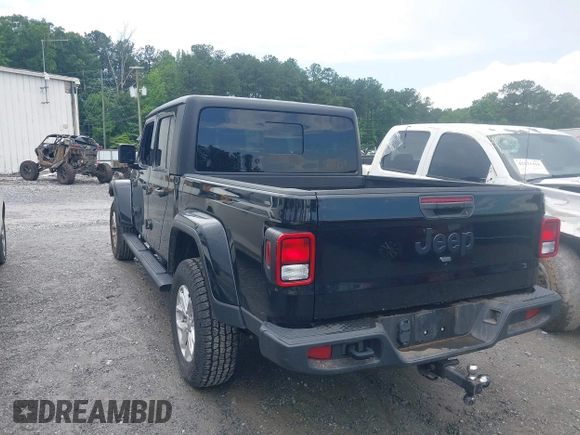 2023 Jeep Gladiator Sport S z VIN 1C6HJTAG3PL521954, wystawiony jako IAAI lot #42502126 z przebiegiem 49 606 mil mil oraz . Historia ofert i sprzedaży dostępna na DreamBid. Obrazek 3.