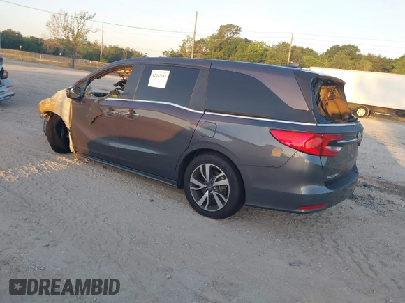 2023 Honda Odyssey Touring with VIN 5FNRL6H84PB053582, listed as a IAAI auction lot 42012108 with Not Provided miles and . Bid and sale history available at DreamBid. Image 3.