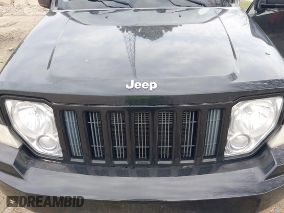 2012 Jeep Liberty Sport with VIN 1C4PJMAK8CW155559, listed as a IAAI auction lot 42131013 with 127,916 mi miles. Bid and sale history available at carsss.com. Image 6.