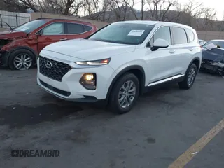 2019 Hyundai Santa Fe SE z VIN 5NMS23AD9KH077362, wystawiony jako IAAI lot #41890584 z przebiegiem 132 476 mil mil oraz . Historia ofert i sprzedaży dostępna na DreamBid. Obrazek 17.