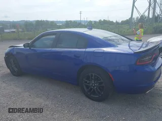 2019 Dodge Charger SXT with VIN 2C3CDXJG4KH550424, listed as a IAAI auction lot 40224159 with 56,988 mi miles and . Bid and sale history available at DreamBid. Image 14.