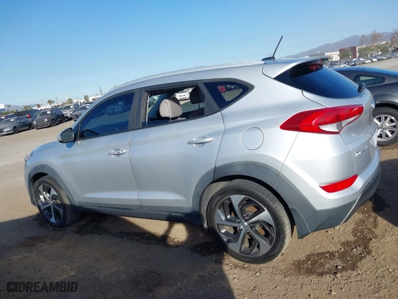 2016 Hyundai Tucson Sport with VIN KM8J33A20GU152145, listed as a IAAI auction lot 41250885 with 117,841 mi miles. Bid and sale history available at carsss.com. Image 14.