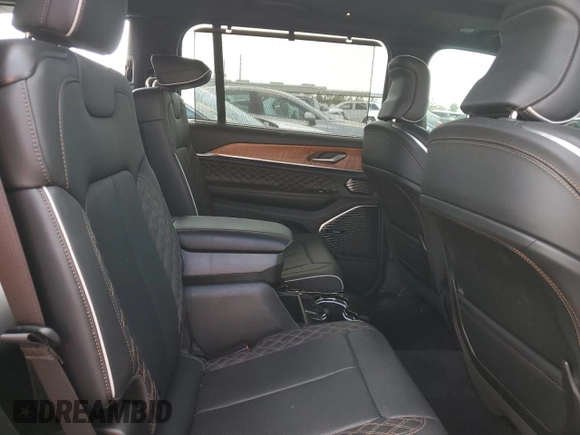 2023 Jeep Grand Cherokee Summit Reserve with VIN 1C4RJKEG5P8853916, listed as a Copart auction lot 52691735 with 18,899 mi miles and Salvage title. Bid and sale history available at DreamBid. Image 11.