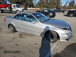 2005 Mercedes-Benz CLK 500 with VIN WDBTK75G55T041461, listed as a Copart auction lot 49849125 with 115,280 mi miles and Salvage title. Bid and sale history available at DreamBid. Image 4.