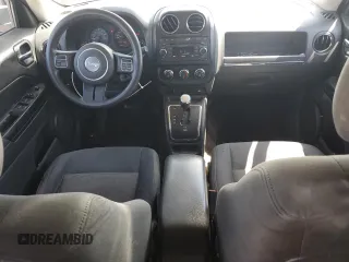 2014 Jeep Patriot Sport with VIN 1C4NJPBB1ED512442, listed as a Copart auction lot 61415565 with 211,715 mi miles and Salvage title. Bid and sale history available at DreamBid. Image 8.