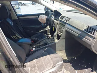 2014 Volkswagen Passat S с VIN 1VWAP7A31EC003851, выставлен на аукционе IAAI как лот 42392804 с пробегом 156 302 миль миль и . История ставок и продаж доступна на DreamBid. Изображение 5.