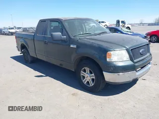 2005 Ford F-150 XLT with VIN 1FTPX12585FA60086, listed as a IAAI auction lot 41859864 with 115,448 mi miles. Bid and sale history available at carsss.com. Image 1.
