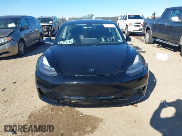 2018 Tesla Model 3 Long Range Battery with VIN 5YJ3E1EA2JF014975, listed as a IAAI auction lot 41319407 with 106,301 mi miles and . Bid and sale history available at DreamBid. Image 12.