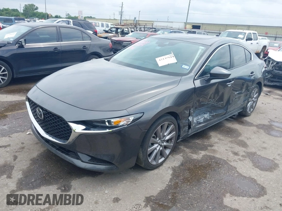 2021 Mazda 3 Preferred with VIN 3MZBPACL6MM252531, listed as a IAAI auction lot 42145811 with 35,869 mi miles and . Bid and sale history available at DreamBid. Image 2.