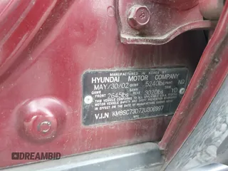 2002 Hyundai Santa Fe GLS with VIN KM8SC73D72U306997, listed as a IAAI auction lot 41519773 with 244,398 mi miles. Bid and sale history available at carsss.com. Image 9.