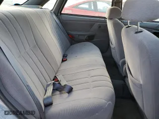 1993 Ford Taurus GL with VIN 1FALP52U6PG231014, listed as a Copart auction lot 69260814 with 156,668 mi miles and Salvage Title. Bid and sale history available at carsss.com. Image 10.