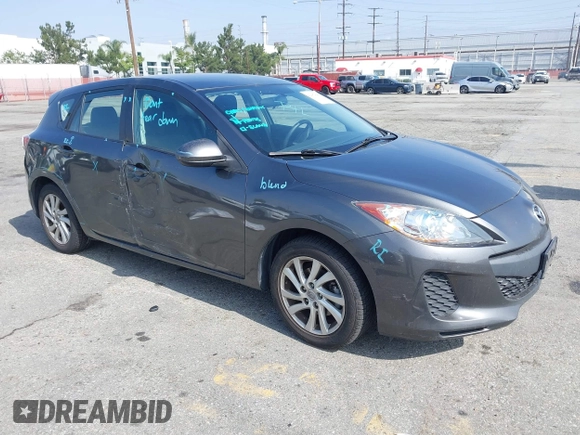 2012 Mazda Mazda3 i Touring with VIN JM1BL1L89C1676291, listed as a IAAI auction lot 42087895 with 61,805 mi miles. Bid and sale history available at carsss.com. Image 1.