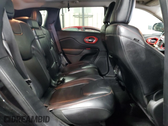2014 Jeep Cherokee Trailhawk with VIN 1C4PJMBSXEW187981, listed as a Copart auction lot 56711885 with 157,317 mi miles and Salvage title. Bid and sale history available at DreamBid. Image 11.
