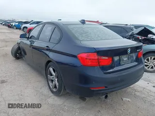 2015 BMW 3 Series 320i with VIN WBA3B1C53FK138310, listed as a IAAI auction lot 41677208 with 57,891 mi miles. Bid and sale history available at carsss.com. Image 3.