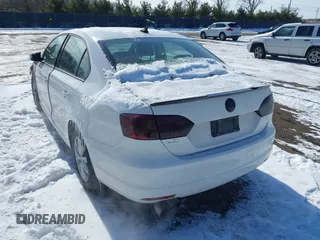 2012 Volkswagen Jetta Sedan SE w/Convenience with VIN 3VWDX7AJ1CM062454, listed as a IAAI auction lot 41580811 with 119,760 mi miles. Bid and sale history available at carsss.com. Image 3.