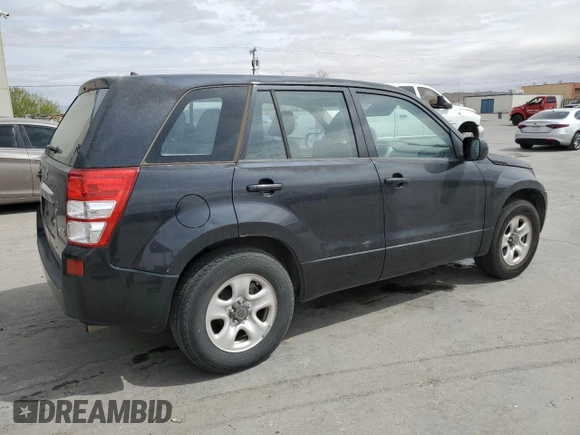 2012 Suzuki Grand Vitara z VIN JS3TE0D59C4100035, wystawiony jako Copart lot #51780435 z przebiegiem 49 620 mil mil oraz Czysty tytuł • Clean title. Historia ofert i sprzedaży dostępna na DreamBid. Obrazek 3.