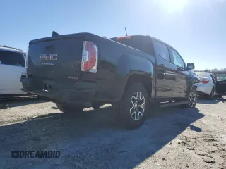 2021 GMC Canyon 4WD AT4 w/Leather with VIN 1GTG6FEN4M1155641, listed as a Copart auction lot 86793644 with 36,940 mi miles and Salvage Title. Bid and sale history available at carsss.com. Image 3.