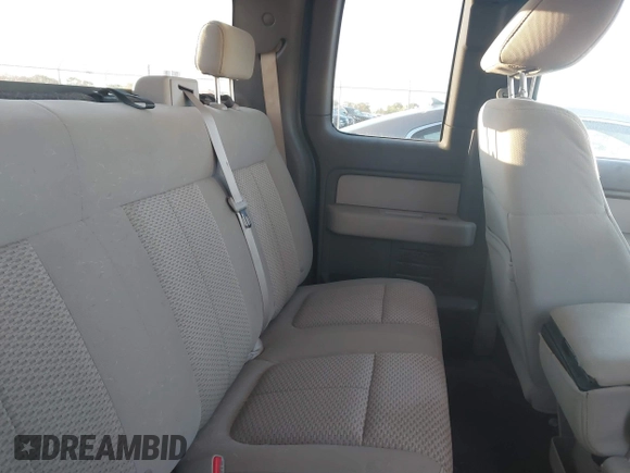 2009 Ford F-150 STX with VIN 1FTRX14869FB33803, listed as a IAAI auction lot 41773290 with 122,945 mi miles and . Bid and sale history available at DreamBid. Image 8.