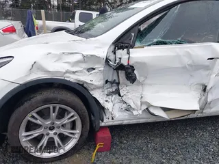 2022 Tesla Model Y Long Range z VIN 7SAYGDEE6NF451259, wystawiony jako IAAI lot #41200775 z przebiegiem 59 683 mil mil oraz . Historia ofert i sprzedaży dostępna na DreamBid. Obrazek 6.