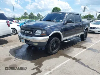 2001 Ford F-150 XLT z VIN 1FTRW08LX1KD56482, wystawiony jako IAAI lot #42155153 z przebiegiem 340 009 mil mil oraz . Historia ofert i sprzedaży dostępna na DreamBid. Obrazek 2.