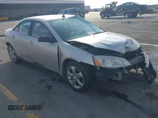 2008 Pontiac G6 GT with VIN 1G2ZH57N984225542, listed as a IAAI auction lot 41679886 with 127,502 mi miles. Bid and sale history available at carsss.com. Image 1.