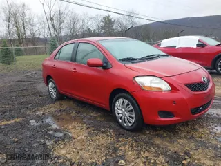 2009 Toyota Yaris with VIN JTDBT903491326454, listed as a IAAI auction lot 41985429 with NaN miles. Bid and sale history available at carsss.com. Image 1.