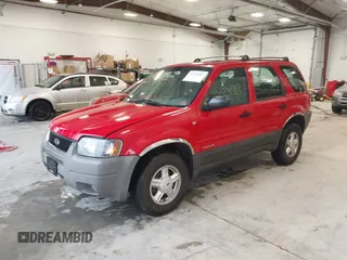 2001 Ford Escape XLS with VIN 1FMYU02191KE79727, listed as a IAAI auction lot 41720383 with 223,554 mi miles. Bid and sale history available at carsss.com. Image 2.