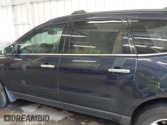 2015 Chevrolet Traverse LT with VIN 1GNKVGKDXFJ356467, listed as a IAAI auction lot 41954861 with 219,697 mi miles and . Bid and sale history available at DreamBid. Image 14.