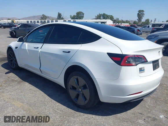 2023 Tesla Model 3 with VIN 5YJ3E1EA0PF621448, listed as a IAAI auction lot 42500155 with 26,589 mi miles and . Bid and sale history available at DreamBid. Image 3.