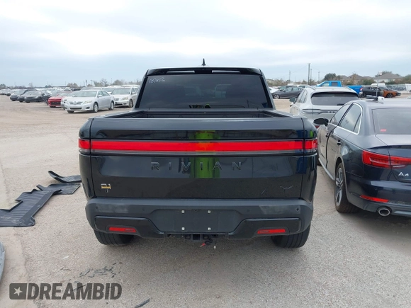 2023 Rivian R1T Adventure with VIN 7FCTGAAA2PN023485, listed as a IAAI auction lot 41227330 with 1 mi miles. Bid and sale history available at carsss.com. Image 16.