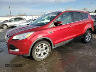 2014 Ford Escape Titanium with VIN 1FMCU0JX1EUB15697, listed as a Copart auction lot 48386535 with 86,178 mi miles and Salvage Title. Bid and sale history available at carsss.com. Image 1.
