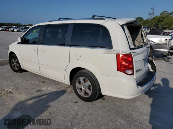 2011 Dodge Grand Caravan Crew with VIN 2D4RN5DG5BR755153, listed as a Copart auction lot 54404625 with 140,307 mi miles and Salvage Title. Bid and sale history available at DreamBid. Image 2.