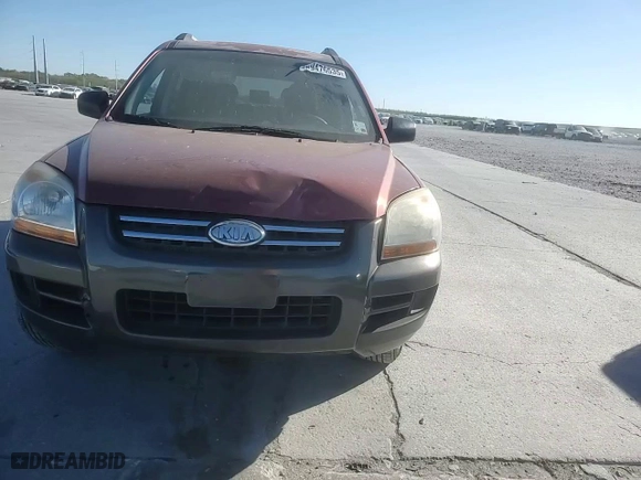 2007 Kia Sportage LX with VIN KNDJF724X77345078, listed as a Copart auction lot 49476535 with 295,468 mi miles and Salvage Title. Bid and sale history available at carsss.com. Image 11.