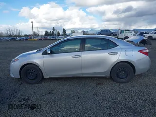 2016 Toyota Corolla L with VIN 5YFBURHEXGP445329, listed as a IAAI auction lot 41799285 with 313,814 mi miles and . Bid and sale history available at DreamBid. Image 14.