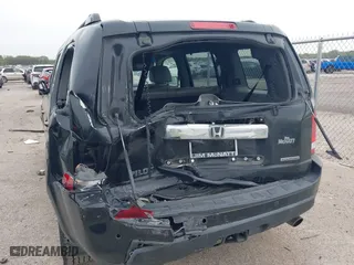 2009 Honda Pilot Touring with VIN 5FNYF388X9B024429, listed as a IAAI auction lot 41924600 with 125,400 mi miles. Bid and sale history available at carsss.com. Image 6.
