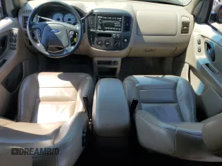 2002 Ford Escape XLT Choice with VIN 1FMCU04172KD00268, listed as a Copart auction lot 61284675 with 118,016 mi miles and Salvage title. Bid and sale history available at DreamBid. Image 8.