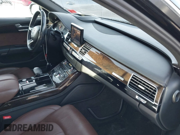 2015 Audi A8 L 4.0T with VIN WAU32AFD0FN035282, listed as a IAAI auction lot 41515136 with 76,518 mi miles. Bid and sale history available at carsss.com. Image 5.