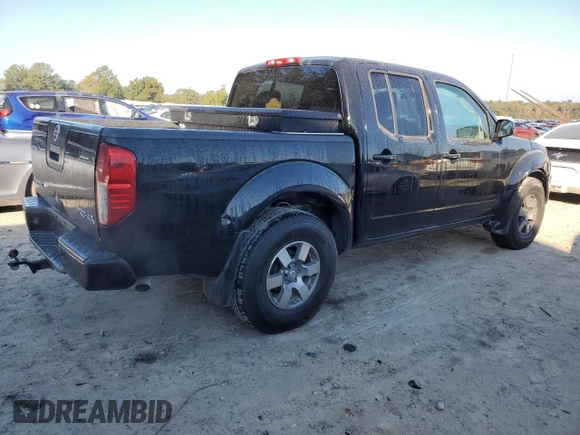 2010 Nissan Frontier LE with VIN 1N6AD0EV1AC407478, listed as a Copart auction lot 82302504 with 146,560 mi miles and Salvage title. Bid and sale history available at DreamBid. Image 3.