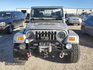 2001 Jeep Wrangler Sport with VIN 1J4FA49S21P346217, listed as a Copart auction lot 46133815 with 103,929 mi miles and Salvage Title. Bid and sale history available at carsss.com. Image 5.