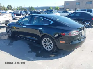 2016 Tesla Model S 90D с VIN 5YJSA1E21GF148336, выставлен на аукционе IAAI как лот 42304073 с пробегом 149 340 миль миль и . История ставок и продаж доступна на DreamBid. Изображение 3.