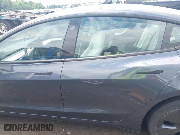 2023 Tesla Model 3 with VIN 5YJ3E1EAXPF628911, listed as a IAAI auction lot 42362410 with 25,387 mi miles and . Bid and sale history available at DreamBid. Image 15.