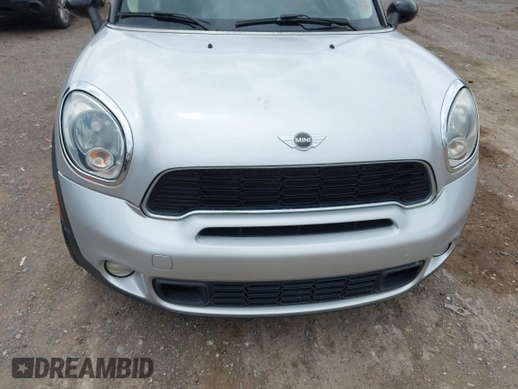 2011 MINI Countryman S with VIN WMWZC5C51BWM10385, listed as a IAAI auction lot 41952679 with 112,008 mi miles and . Bid and sale history available at DreamBid. Image 6.